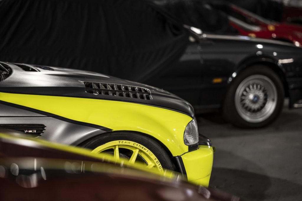 The back of a bright yellow racing car